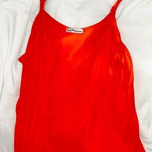 Fluorescent Orange. Adjustable straps.